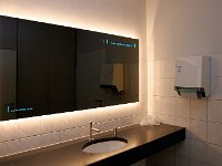 WireTap Indoor Lighting 03  Mirror in a washing room, illuminated with WireTap cable and colour change LED lights.